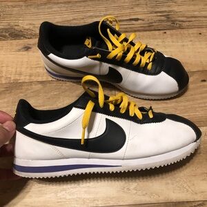 Nike Cortez size 11 black white yellow n purple.